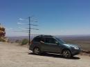 Parked on the Moki Dugway, three feet on the other side of the rover the cliff drops 1000 feet to the valley floor. (N5SJ photo) 
